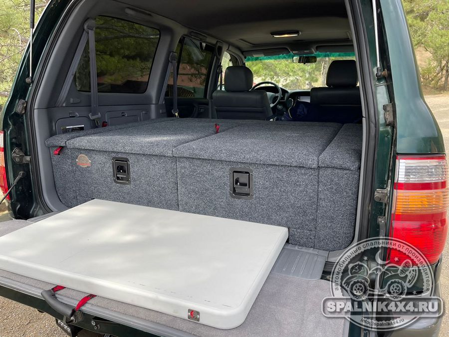 Тойота Ленд Крузер 100 - автомобильный спальник с интегрированным раскладным столом