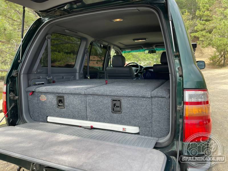 Toyota Land Cruiser 100 7-мест - Спальник с ящиками ув. объема + стол
